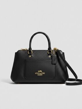 Coach New York leather satchel bag with gold hardware.